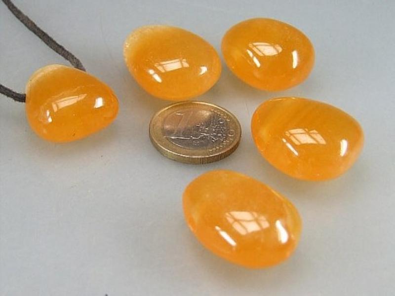 Orangencalcit Trommelstein